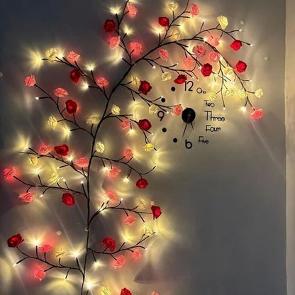 FabRosette rose branch wall light with illuminated flowers