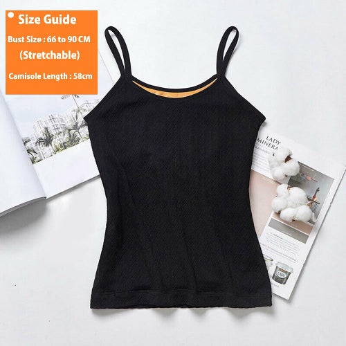Black camisole with size guide on an open magazine