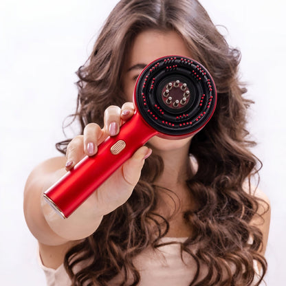 Front view of the red scalp oil applicator brush