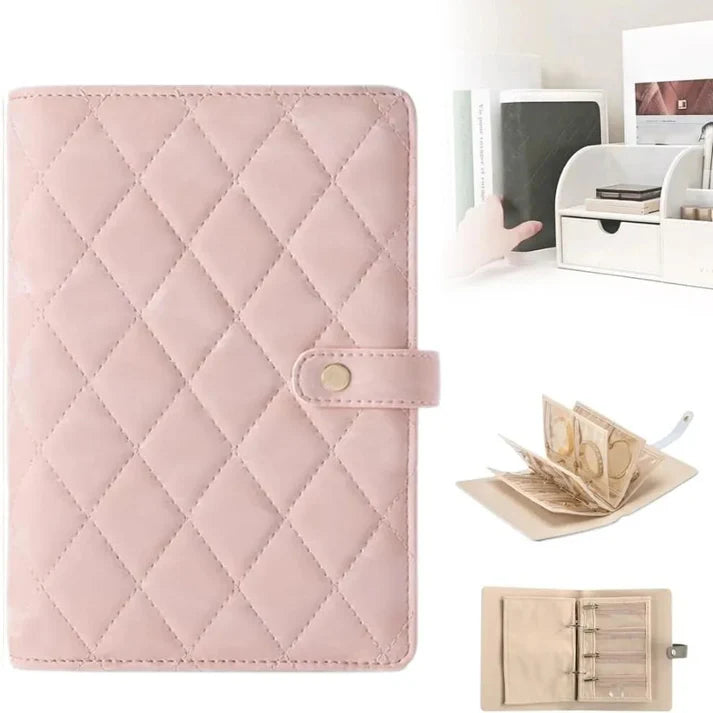 Quilted pink wallet with a close-up of money and pen on a white surface.